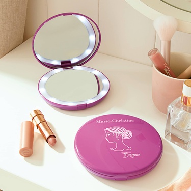 Miroir de poche grossissant lumineux 